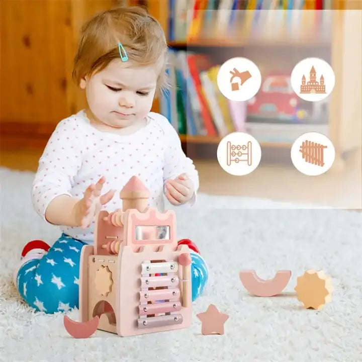 Cube_d_activite_Montessori_en_bois_Chateau_Magique_5_en_1_rose_pour_bebe_fille
