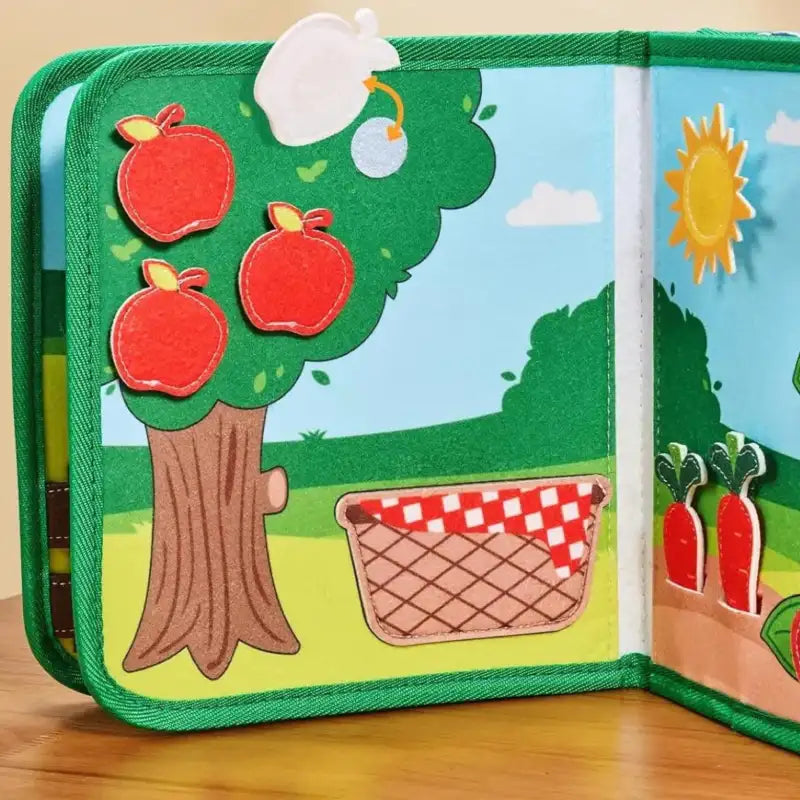livre-busy-board-tissu-bebe-1-an-pommes-rouges