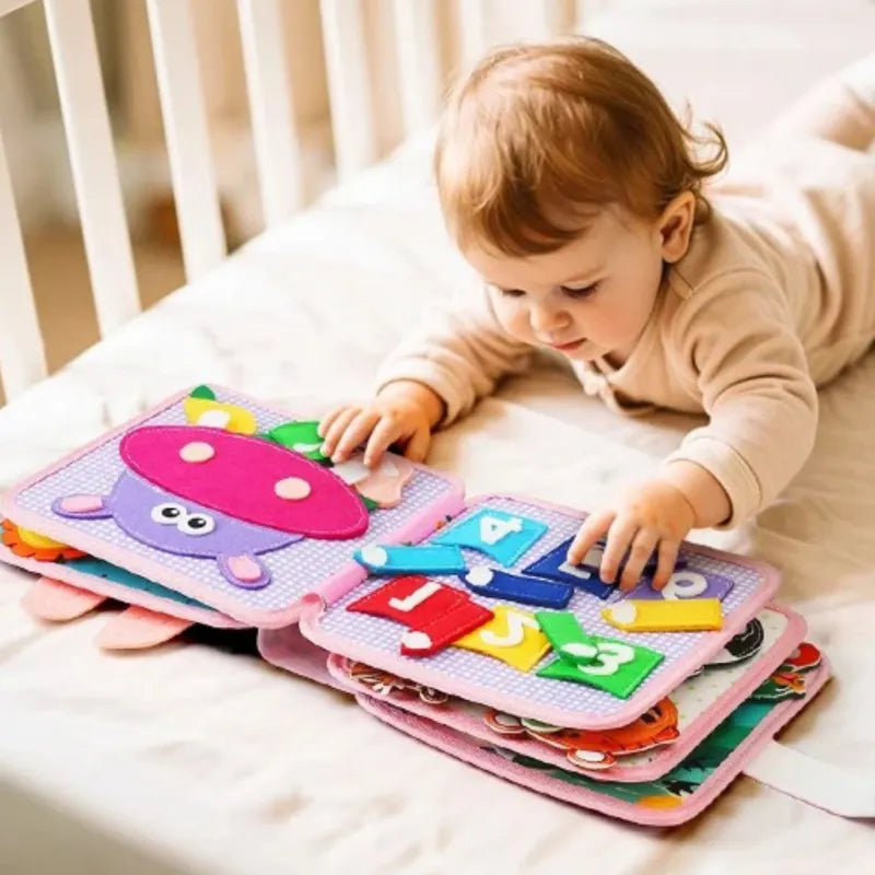 livre-busy-board-tissu-rose-bebe-fille-1-an