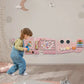 busy-board-mural-crocodile-rose-planche-montessori-cadeau-fille-18-mois