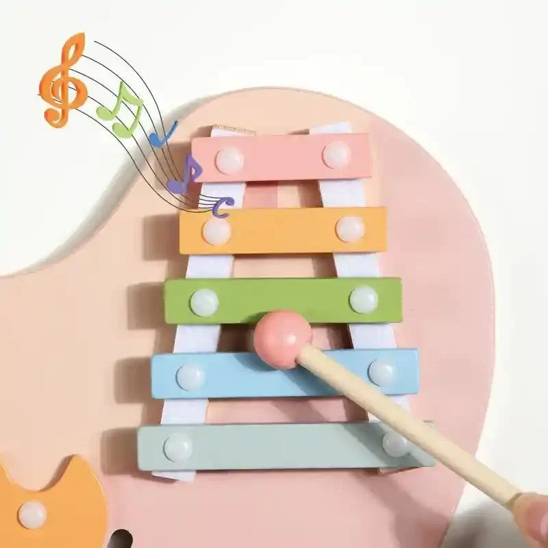 busy-board-mural-rose-planche-montessori-fond-blanc-musical-fond-blanc